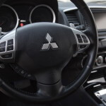 The steering wheel of the 2014 Lancer Sportback